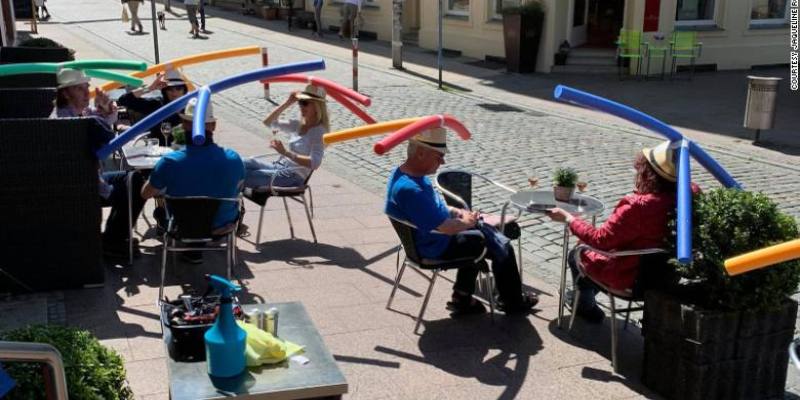 A cafe in Germany finds pool noodles solution to ensure social distance